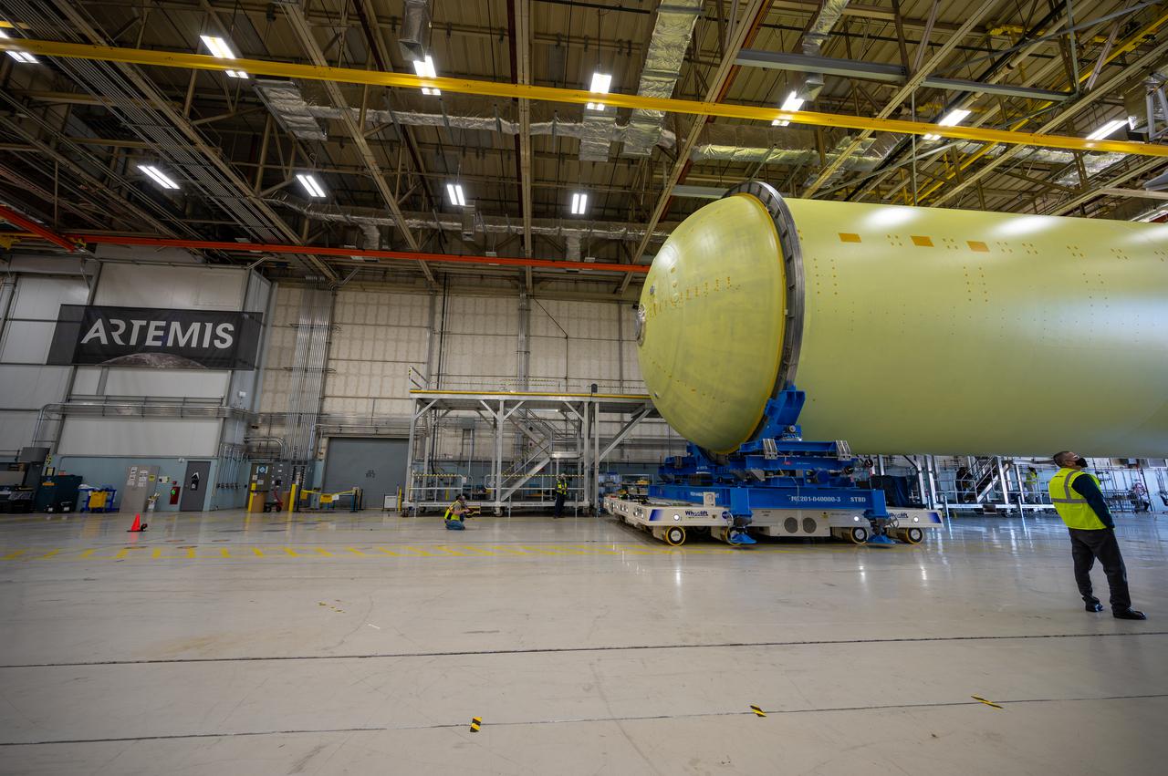 This image highlights the liquid hydrogen tank that will be used on the core stage of NASA’s Space Launch System rocket for Artemis II, the first crewed mission of NASA’s Artemis program. The tank is being built at NASA’s Michoud Assembly Facility in New Orleans. The SLS core stage is made up of five unique elements: the forward skirt, liquid oxygen tank, intertank, liquid hydrogen tank, and the engine section. The liquid hydrogen tank holds 537,000 gallons of liquid hydrogen cooled to minus 423 degrees Fahrenheit and sits between the core stage’s intertank and engine section. The liquid hydrogen hardware, along with the liquid oxygen tank, will provide propellant to the four RS-25 engines at the bottom of the cores stage to produce more than two million pounds of thrust to launch NASA’s Artemis missions to the Moon. Together with its four RS-25 engines, the rocket’s massive 212-foot-tall core stage — the largest stage NASA has ever built — and its twin solid rocket boosters will produce 8.8 million pounds of thrust to send NASA’s Orion spacecraft, astronauts and supplies beyond Earth’s orbit to the Moon and, ultimately, Mars. Offering more payload mass, volume capability and energy to speed missions through space, the SLS rocket, along with NASA’s Gateway in lunar orbit, the human landing system, and Orion spacecraft, is part of NASA’s backbone for deep space exploration and the Artemis lunar program. No other rocket can send astronauts in Orion around the Moon in a single mission.